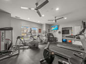 Thumbnail 24 of 30 - On-site fitness center at apartment community