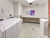 Thumbnail 18 of 35 - onsite laundry center at Madison WI apartments