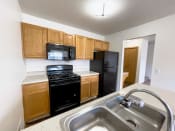 Thumbnail 7 of 27 - Traditional Style Kitchen at Bloomfield Townhomes Kitchen