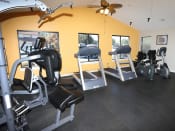 Thumbnail 12 of 28 - gym area with treadmills, weight machines, and more