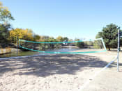 Thumbnail 21 of 28 - beach volleyball court alongside stocked fishing pond