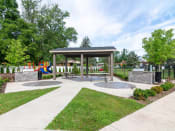 Thumbnail 22 of 27 - covered picnic area at Grand Rapids Apartments