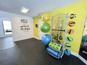 Thumbnail 15 of 27 - Eastland Apartments fitness studio with yoga balls