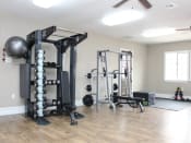 Thumbnail 13 of 25 - lot of exercise equipment to choose from at homestead apartments gym