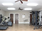 Thumbnail 15 of 25 - well equipped apartment gym at homestead apartments
