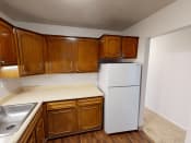 Thumbnail 6 of 18 - Kitchen area of two bedroom apartment in Southfield Michigan's chateau riviera apartments
