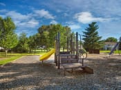 Thumbnail 5 of 13 - Apartment Playground area at indian woods in Evansville