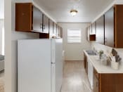 Thumbnail 5 of 11 - Fully-Equipped Apartment Kitchen