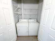 Thumbnail 10 of 25 - in-unit washer and drying available at shoreline landing apartments in norton shores