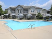 Thumbnail 12 of 25 - Swimming pool at Norton Shores apartment complex, shoreline landing