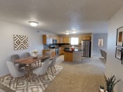 Thumbnail 1 of 10 - a kitchen and dining area in Minot apartment