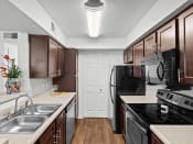Thumbnail 4 of 29 - our apartments offer a modern kitchen with stainless steel appliances