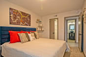 Thumbnail 10 of 25 - Apartments for Rent Nashville - The Canvas - Spacious Bedroom with Plush Carpeting, Stylish Decor, and a Closet