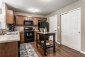 Thumbnail 2 of 16 - Bedford Place Apartments Blacklick Ohio Updated interior Spacious Kitchen with oak cabinets, full pantry, excess storage