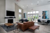 Thumbnail 13 of 25 - the estates at tanglewood|living room with fireplace and television