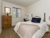 Thumbnail 30 of 56 - Comfortable Bedroom With Large Window at Woodlands Village Apartments, Flagstaff, AZ, 86001