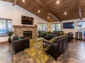 Thumbnail 37 of 56 - Lounge Area With Fireplace at Woodlands Village Apartments, Flagstaff, AZ, 86001