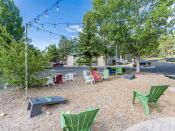 Thumbnail 45 of 56 - Courtyard Sitting  at Woodlands Village Apartments, Flagstaff, AZ