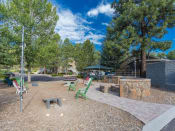 Thumbnail 46 of 56 - Outdoor Sitting Arrangements at Woodlands Village Apartments, Flagstaff, 86001