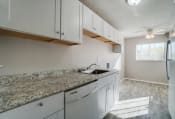 Thumbnail 11 of 46 - Granite Countertop Kitchen at Finneytown Apartments and Townhomes, Cincinnati, Ohio