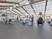 Thumbnail 15 of 29 - Fitness Center, Cardio Equipment at Stuart Woods Apartments, Herndon VA, 20170