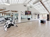 Thumbnail 16 of 29 - Fitness Center, Yoga studio, spin studio at Stuart Woods Apartments, Herndon VA, 20170