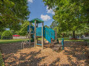 Thumbnail 22 of 34 - Playground structure with play area at Woodlee Terrace Apartments, Woodbridge