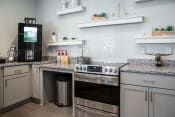 Thumbnail 9 of 48 - Chef-Inspired Kitchens at Century Park Place Apartments, Morrisville