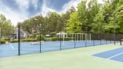 Thumbnail 42 of 48 - Brodick Hills tennis court with pool