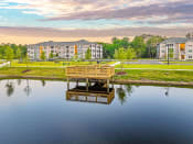 Thumbnail 62 of 62 - a view of a lake with apartments in the background