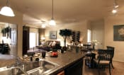 Thumbnail 37 of 47 - Kitchen and living space at the Haven at Reed Creek Apartments Martinez, GA