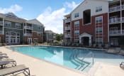 Thumbnail 17 of 47 - Spacious pool with sundeck at the Haven at Reed Creek Martinez, GA