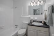 Thumbnail 12 of 18 - this is a photo of the bathroom in a 1 bedroom apartment at deer hill apartments in c