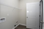 Thumbnail 23 of 31 - Laundry room with washer and dryer hookups at Highborne aartments Augusta, GA