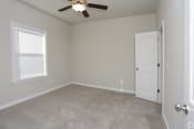 Thumbnail 27 of 31 - Spacious bedroom with ceiling fan Highborne apartments Augusta, GA
