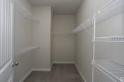 Thumbnail 26 of 31 - Spacious walk-in closet with shelving at Highborne apartments Augusta, GA