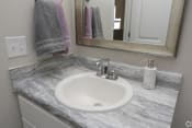 Thumbnail 20 of 31 - Spacious bathroom sink countertop at Highborne apartments Augusta, GA
