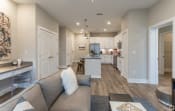 Thumbnail 14 of 24 - Living Room With Kitchen View at Ansley Park Apartments, North Carolina, 28412