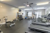 Thumbnail 27 of 47 - the gym at the whispering winds apartments in pearland, tx
