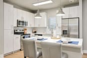 Thumbnail 17 of 62 - Chef-Inspired Kitchens Feature Stainless Steel Appliances at Exchange at St Augustine, Florida, 32086