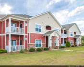 Thumbnail 2 of 25 - Exterior with grass and apartment entrance at the Haven at Market Street Station Johnson City, TN