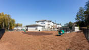 Thumbnail 44 of 46 - the preserve at ballantyne commons dog park with playground and buildings