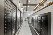 Thumbnail 37 of 39 - a long hallway with lockers in a data center