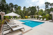 Thumbnail 25 of 34 - Gorgeous Modern Pool with Sunshelf and Lounge Chairs for Relaxing at Echo at North Pointe Center Apartment Homes, Alpharetta, GA 30009