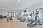 Thumbnail 21 of 35 - the gym is equipped with cardio equipment and weights