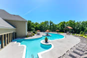 Thumbnail 22 of 24 - Refreshing Swimming Pool with Relaxing Poolside Lounge Chairs at Hampton Woods, Kansas, 66217