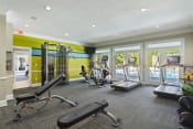 Thumbnail 15 of 33 - Fitness Center with Cardio Machines located at St. Andrews Apartments in Johns Creek, GA 30022
