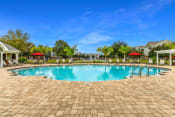 Thumbnail 8 of 18 - Swimming pool with sundeck at The Finley, Jacisonville, FL  32210