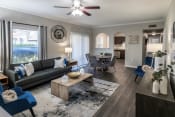 Thumbnail 5 of 33 - Spacious Living Room with Ceiling Fan and LVT Flooring  located at Retreat at Steeplechase in Houston, TX 77065