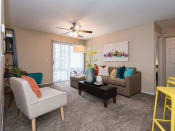 Thumbnail 1 of 24 - Modern living room at Reflection Cove Apartments in Missouri